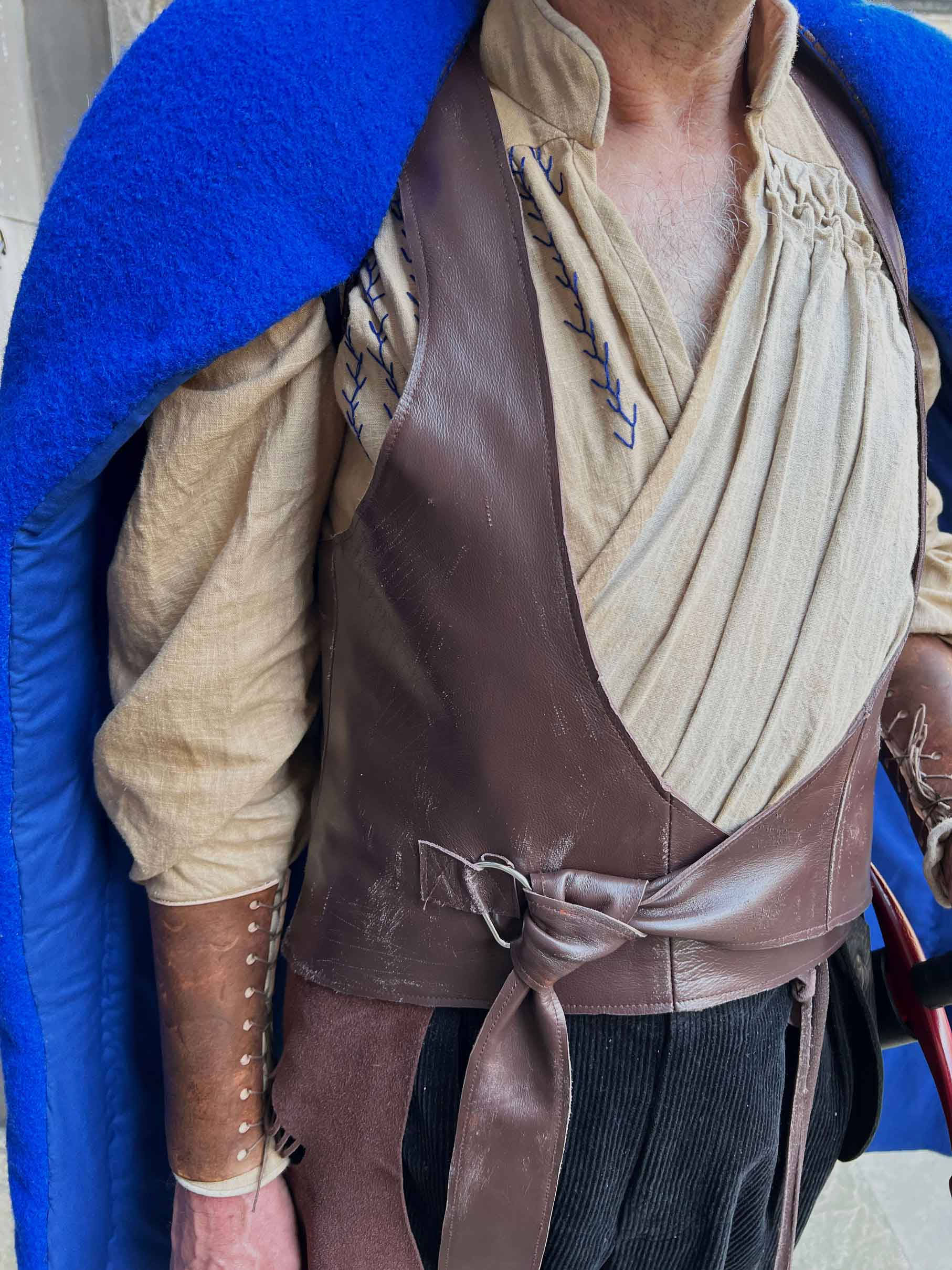 A detail shot of the costume showing the shirt and waistcoat