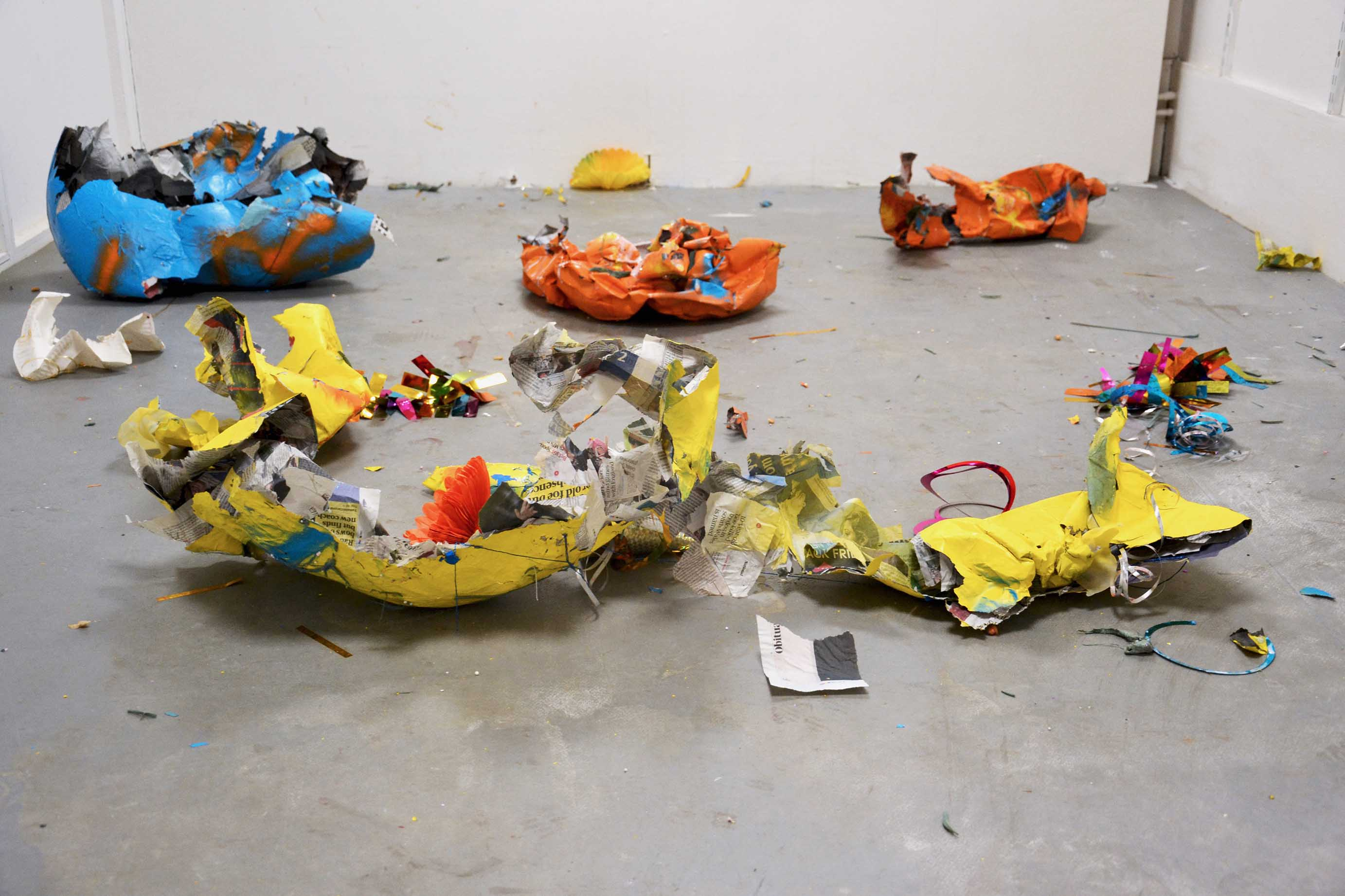 LAID WASTE, 2021 - Empty fragments of spray paint on papier mâché, slime, bouncing putty,  party decorations