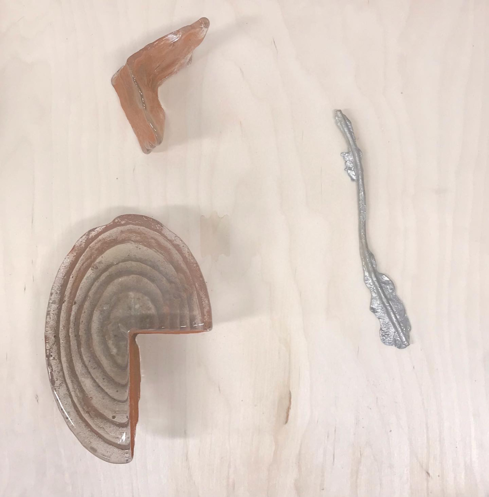 Pewter cast of an electrical  wire and sand cast glass