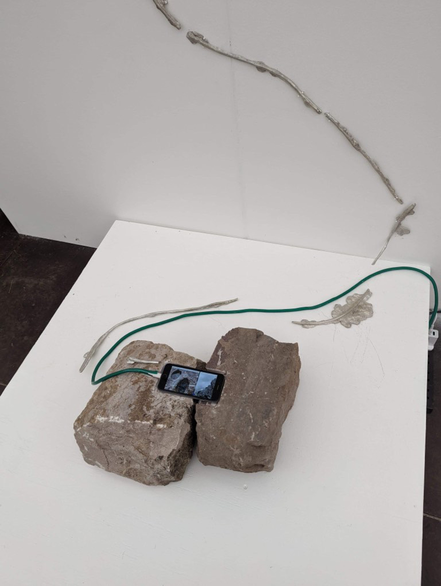 Carved limestone and pewter casts